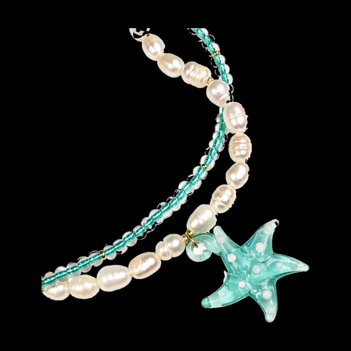 Perlas y estrella turquesa